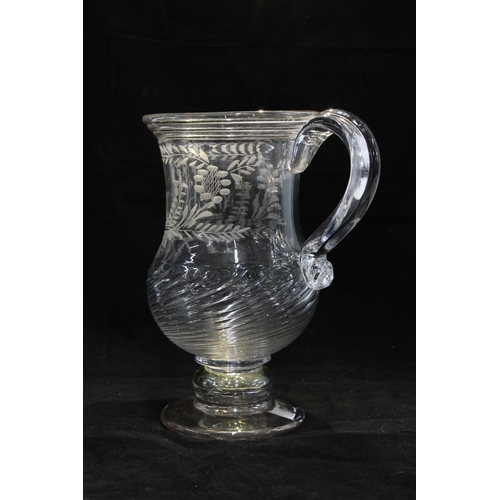 153 - Wrythen moulded coin tankard on raised foot, enclosed token marked MH which matches the engraved ini... 