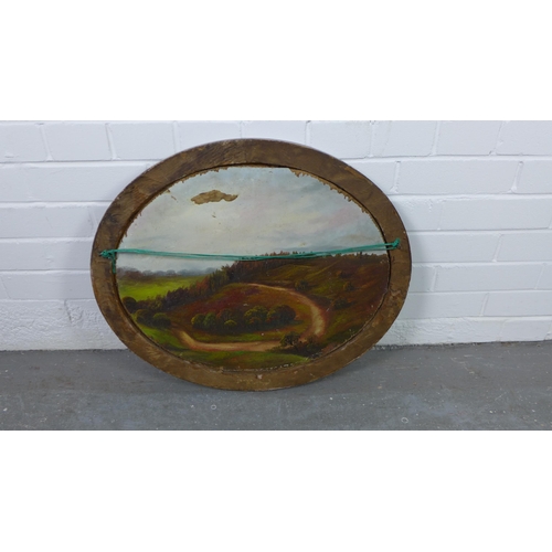 191 - H Burton, village scene, oil on board, signed and dated 1931, in an oval frame, 50 x 40cm