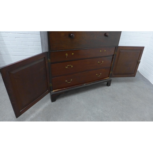 201 - Georgian mahogany secretaire cabinet, the top with glazed doors and a shelved interior over a secret... 