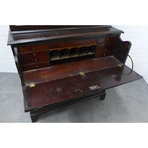 201 - Georgian mahogany secretaire cabinet, the top with glazed doors and a shelved interior over a secret... 