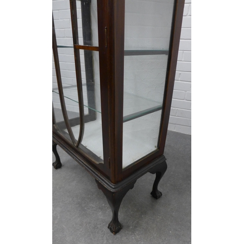 204 - Early 20th century mahogany ledgeback display cabinet with glazed door and shelved interior, on shor... 