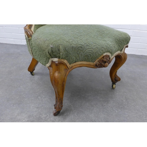 205 - Victorian walnut chair with upholstered back and seat on cabriole legs terminating on ceramic castor... 