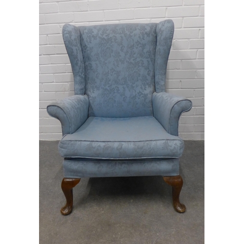 206 - Pair of wingback armchairs with pale blue damask style upholstery, on cabriole legs (2).