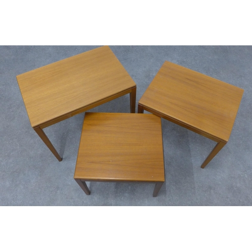 207 - Nest of three teak tables. 50 x 60 x 40cm.