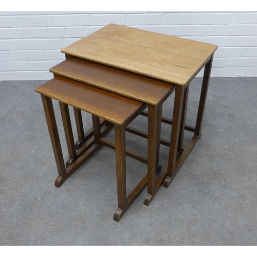 211 - Nest of three teak tables. 54 x 56 x 38cm.