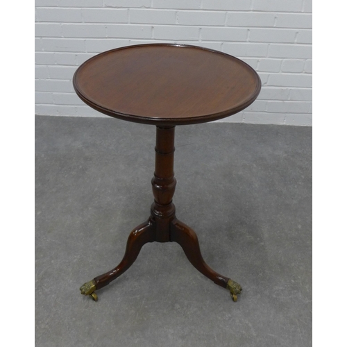 212 - Mahogany pedestal table, the circular dished top on a baluster turned column and tripod legs with br... 