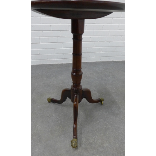 212 - Mahogany pedestal table, the circular dished top on a baluster turned column and tripod legs with br... 