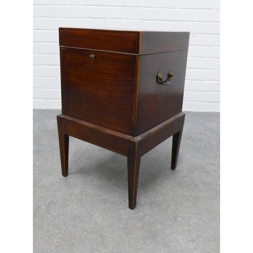 213 - Georgian mahogany cellarette box on stand, with brass side handles, 59 x 36cm.