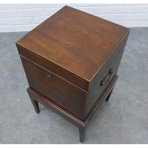 213 - Georgian mahogany cellarette box on stand, with brass side handles, 59 x 36cm.