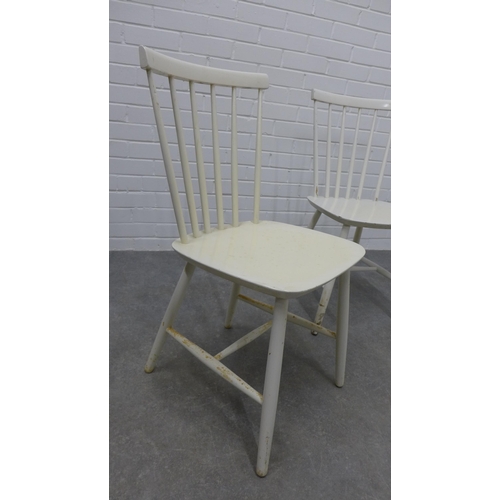 219 - Pair of Danish white painted chairs,  stamped made in Denmark. 82 x 40cm. (2)