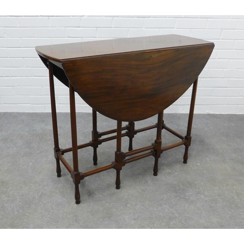 220 - Edwardian mahogany spider gateleg table, with oval drop leaf sides. 72 x 95 x 87cm.