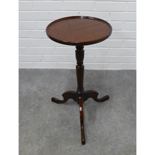 228 - Mahogany pedestal table a circular dished top. 61 x 39cm.