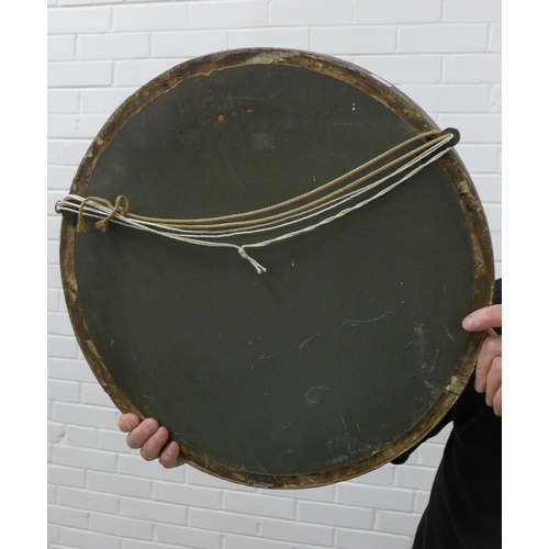 229 - Circular gilt framed wall mirror with an ebonised slip. 47cm.