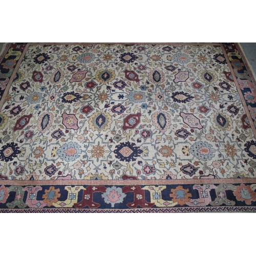 240 - Eastern rug, ivory field with foliate pattern, 370 x 288cm