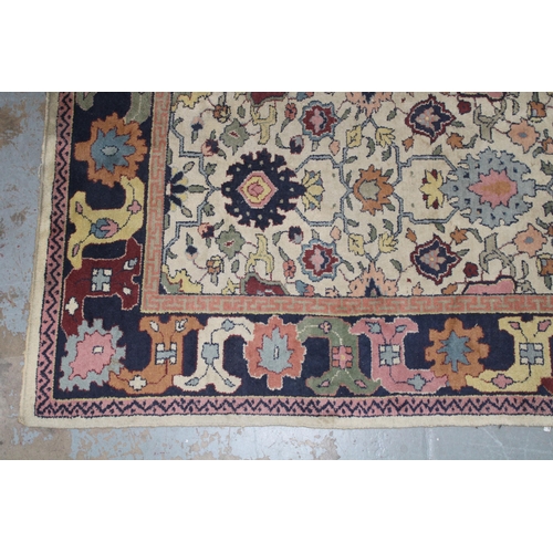 240 - Eastern rug, ivory field with foliate pattern, 370 x 288cm