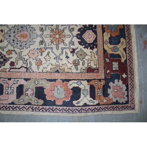 240 - Eastern rug, ivory field with foliate pattern, 370 x 288cm