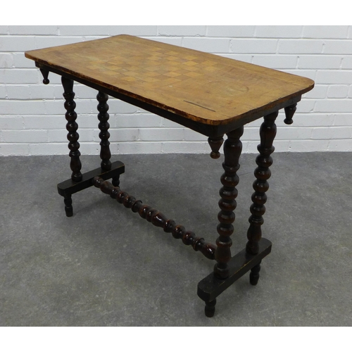 243 - Victorian table with double bobbin legs and stretcher, possibly with a replacement Games table top. ... 