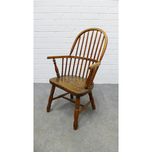 247 - Child's elm and ash Windsor chair with hoop back, solid seat and turned legs & stretcher, with loose... 