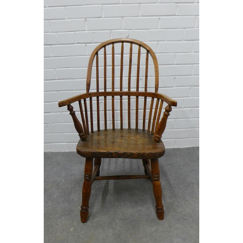 247 - Child's elm and ash Windsor chair with hoop back, solid seat and turned legs & stretcher, with loose... 