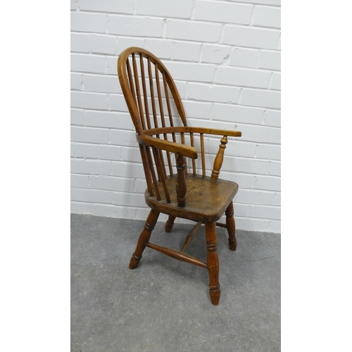 247 - Child's elm and ash Windsor chair with hoop back, solid seat and turned legs & stretcher, with loose... 