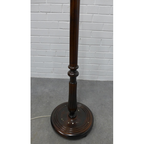 255 - Mahogany standard lamp. 140cm.