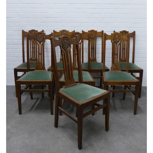 260 - Set of eight Art Nouveau oak chairs with upholstered seats,  103 x 44 x 40cm. (8)