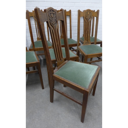 260 - Set of eight Art Nouveau oak chairs with upholstered seats,  103 x 44 x 40cm. (8)