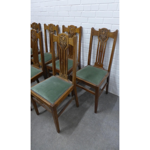 260 - Set of eight Art Nouveau oak chairs with upholstered seats,  103 x 44 x 40cm. (8)