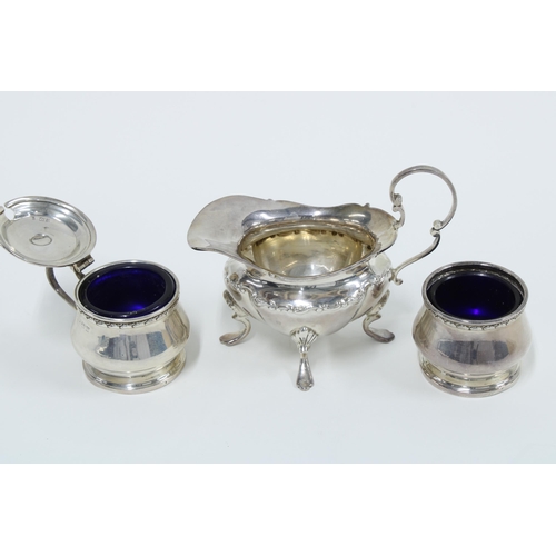 27 - Victorian silver cream jug, Sheffield 1900 and a silver salt with matching silver mustard pot, Birmi... 