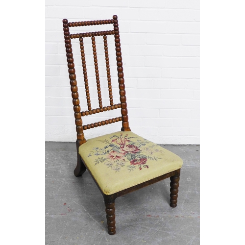 272 - 19th century bobbin spindle back chair, with bobbin turned front legs and floral upholstery, likely ... 