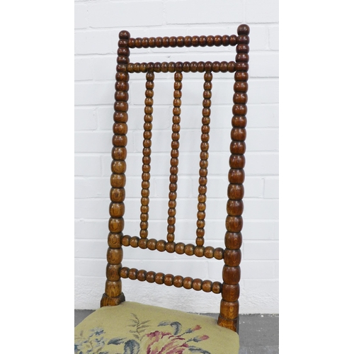 272 - 19th century bobbin spindle back chair, with bobbin turned front legs and floral upholstery, likely ... 