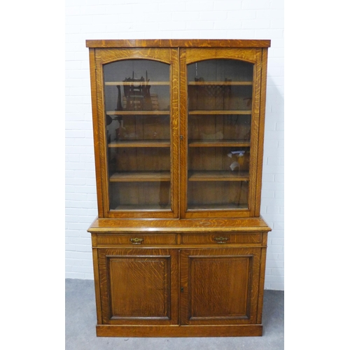 278 - Late 19th / early 20th century oak bookcase cabinet, the top with a pair of glazed doors with a shel... 