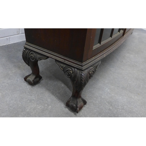 279 - Mahogany bow fronted cabinet with astragal glazed doors , shelved interior, on carved cabriole legs,... 