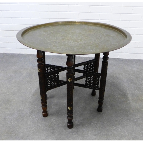 288 - Benares style table, brass circular top on wooden stand with mother of pearl inlaid pattern,  57 x 6... 