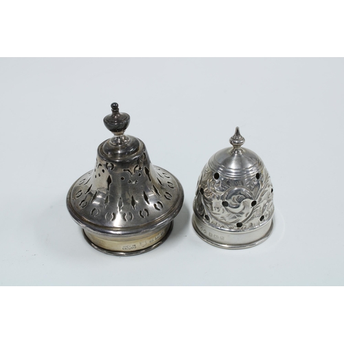 29 - Two silver topped and cut glass sugar castors, Sheffield 1925 &  Birmingham 1956, taller 17cm (2)