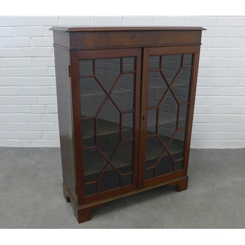 291 - Mahogany glazed cabinet with two glazed doors and shelved interior on bracket feet. 100 x 77 x 30cm.