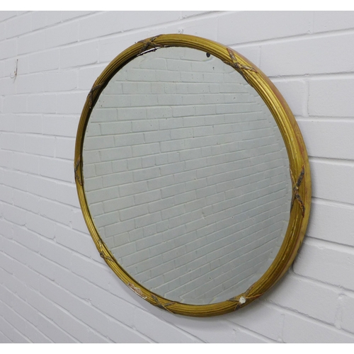 304 - Gilt gesso framed oval wall mirror. 66 x 75cm. (a/f)