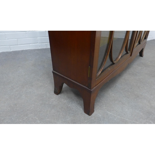 306 - Mahogany display cabinet with astragal glazed doors and shelved interior, 172 x 124 x 34cm.