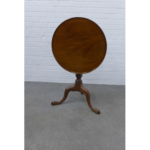 309 - Mahogany tilt top table with a circular dished top, pedestal base and tripod legs with pad feet  69 ... 