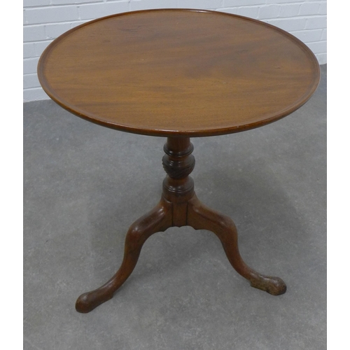 309 - Mahogany tilt top table with a circular dished top, pedestal base and tripod legs with pad feet  69 ... 