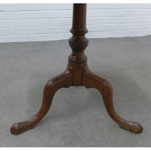 309 - Mahogany tilt top table with a circular dished top, pedestal base and tripod legs with pad feet  69 ... 