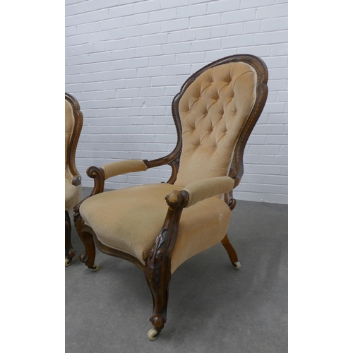 311 - Late 19th / early 20th century mahogany showframe buttonback open armchair together with a similar s... 