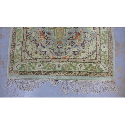 314 - Eastern wool rug, pale green field with allover foliate pattern, 186 x 94cm