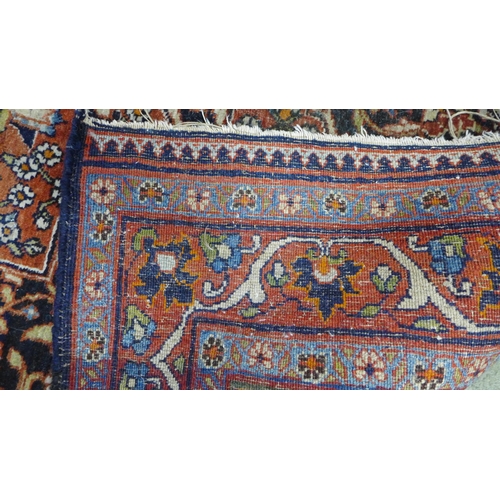 319 - Persian rug with all-over foliate pattern, ivory spandrels and blue borders,  166 x 110cm