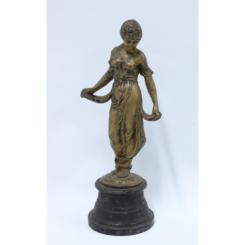 336 - Bronzed metal female figure on a circular iron base, 30cm