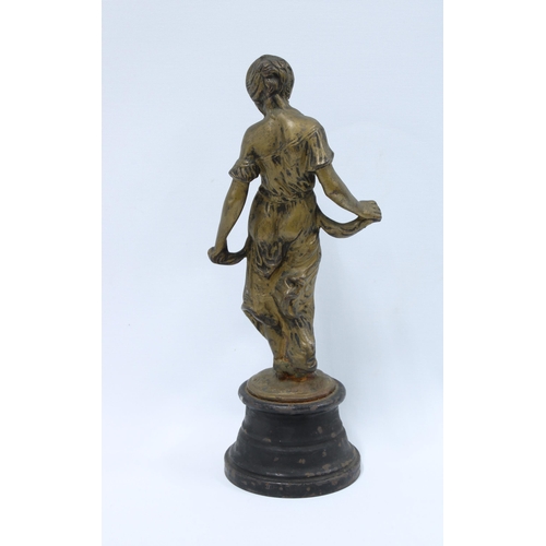 336 - Bronzed metal female figure on a circular iron base, 30cm