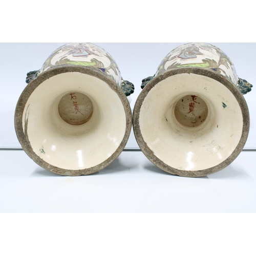 340 - A large pair of Japanese earthenware vases, 50cm (a/f) (3)