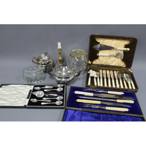 348 - Carton containing miscellaneous Epns flatware, teaset, brass candlestick, glass jelly mould and a bi... 