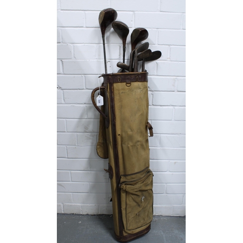 354 - Vintage golf clubs and a golf bag (a lot)