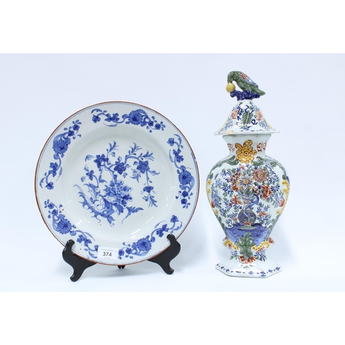 374 - Delft polychrome vase and cover and a Delft blue and white plate, 31cm diameter (2)